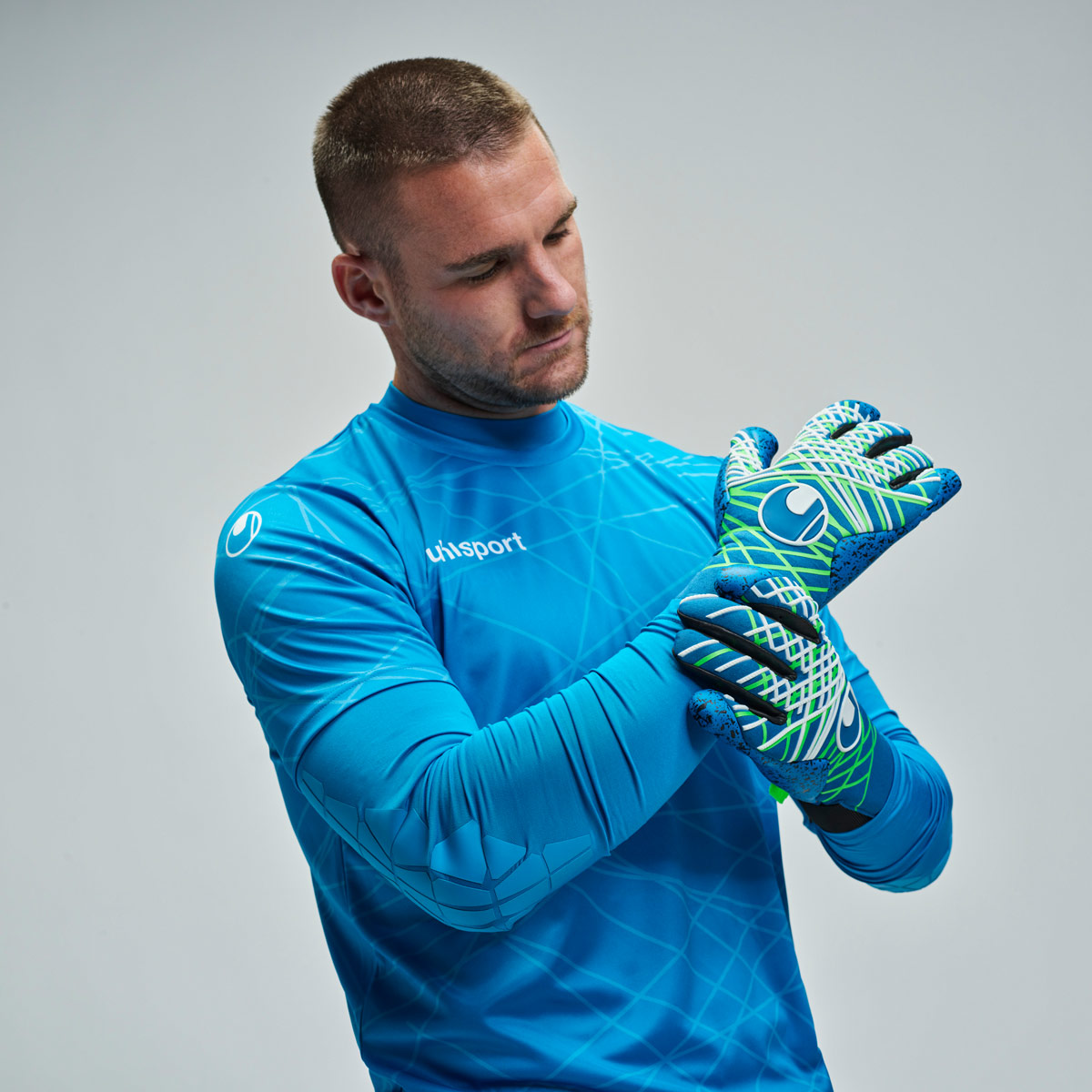 uhlsport Aquagrip HN Torwarthandschuhe uhlsport Aquagrip HN Torwarthandschuhe in Blau-Weiß für Matches bei Regenwetter