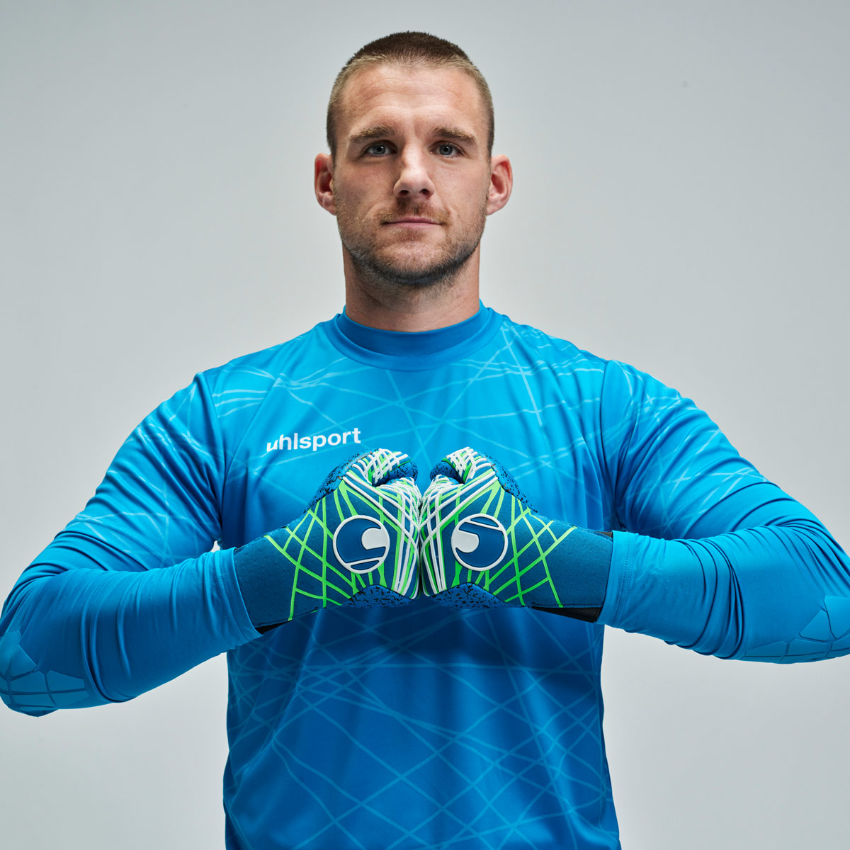 uhlsport Aquagrip HN Torwarthandschuhe uhlsport Aquagrip HN Torwarthandschuhe in Blau-Weiß für Matches bei Regenwetter